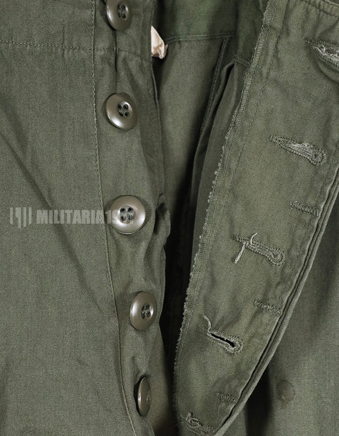 Real 1967 poplin fabric jungle fatigues pants, used, repaired.